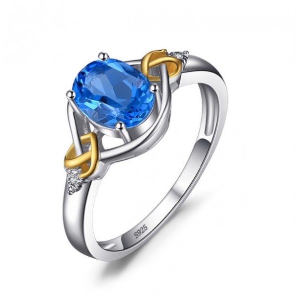 Кольцо с голубым топазом и цирконием , С2281