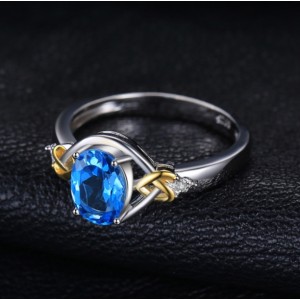 Кольцо с голубым топазом и цирконием , С2281