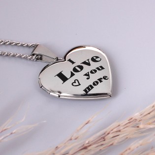 Медальон в форме сердца "Я люблю тебя больше"