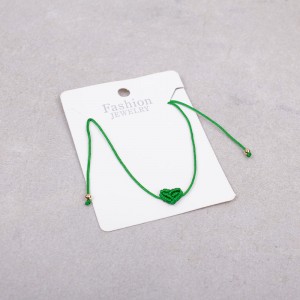 Плетеный браслет "Сердце" зеленый, С10105